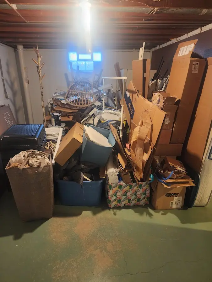 Roll-off dumpster container at job site for 15 Yard Dumpster Rental in Berea